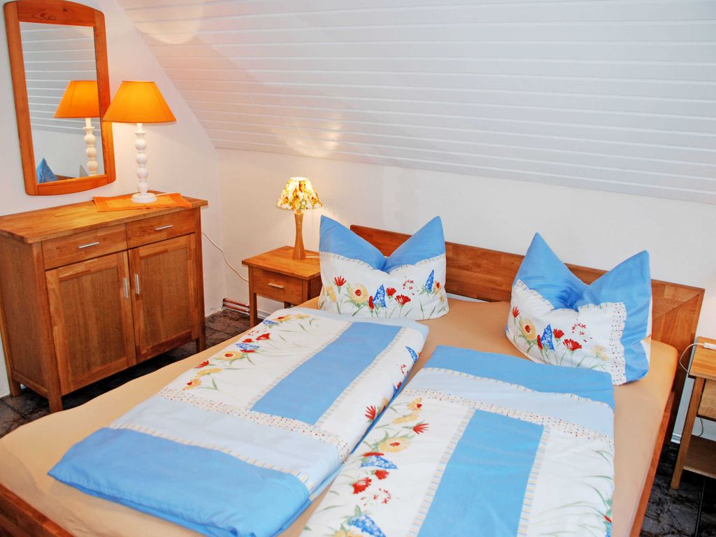 Ferienwohnung Mönchgut mit Seeblick - Ferienwohnungen im Haus am Deich detail 1