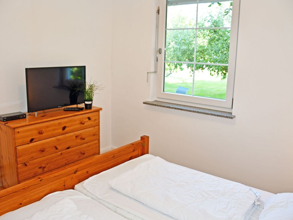 Ferienwohnung Achtern - Ferienwohnungen auf dem Pommernhof mit großem Garten! detail 4