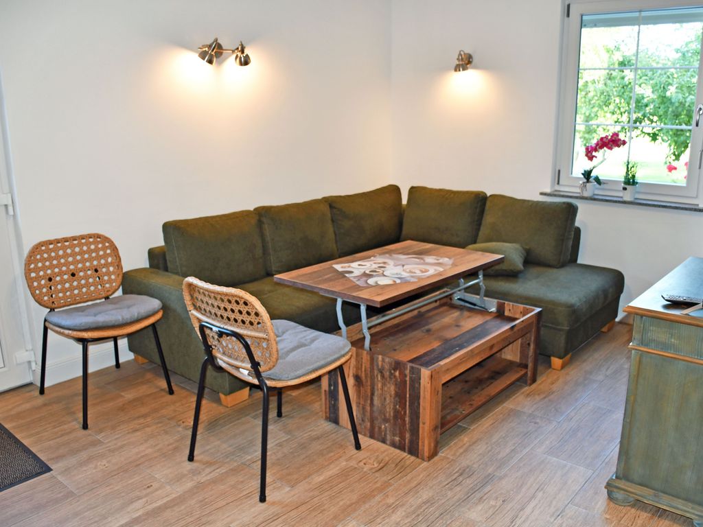 Ferienwohnung Achtern - Ferienwohnungen auf dem Pommernhof mit großem Garten! detail 1