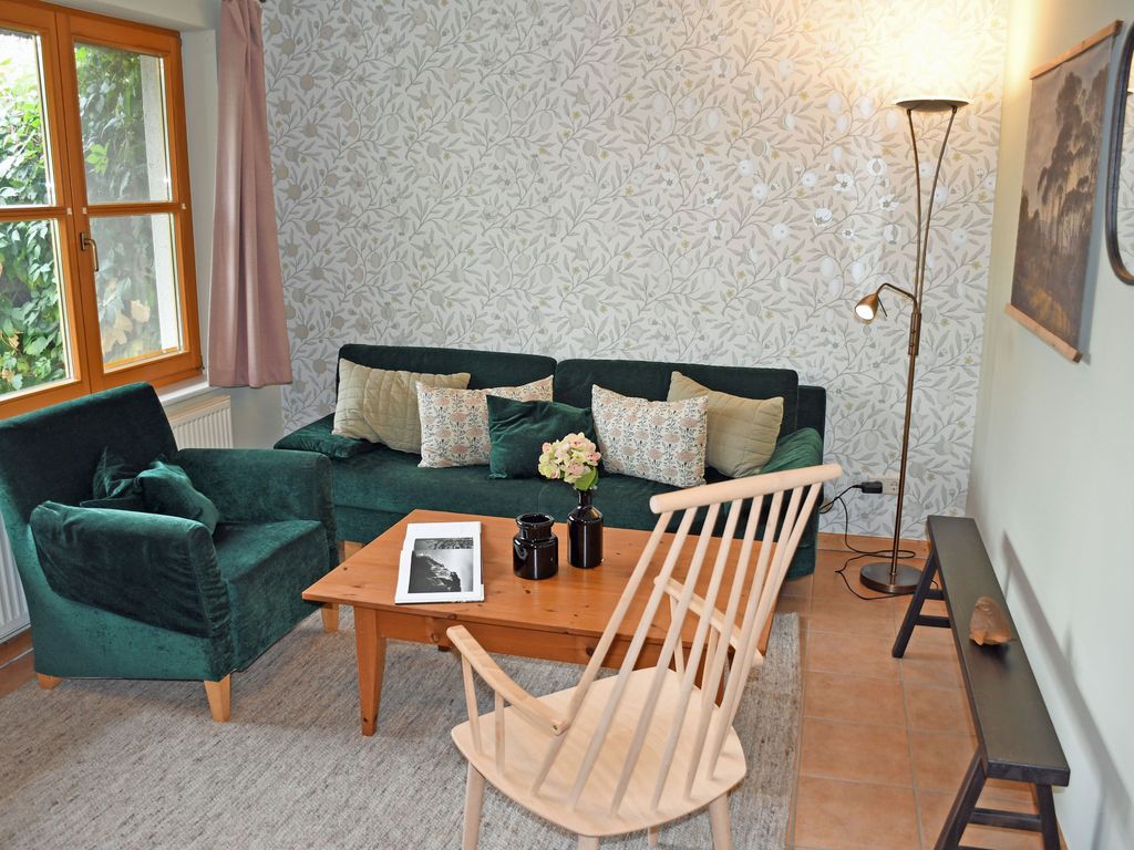 01 Ferienwohnung mit Gartenterrasse - Ferienwohnungen im Fischerdorf und unterm Reetdach detail 1